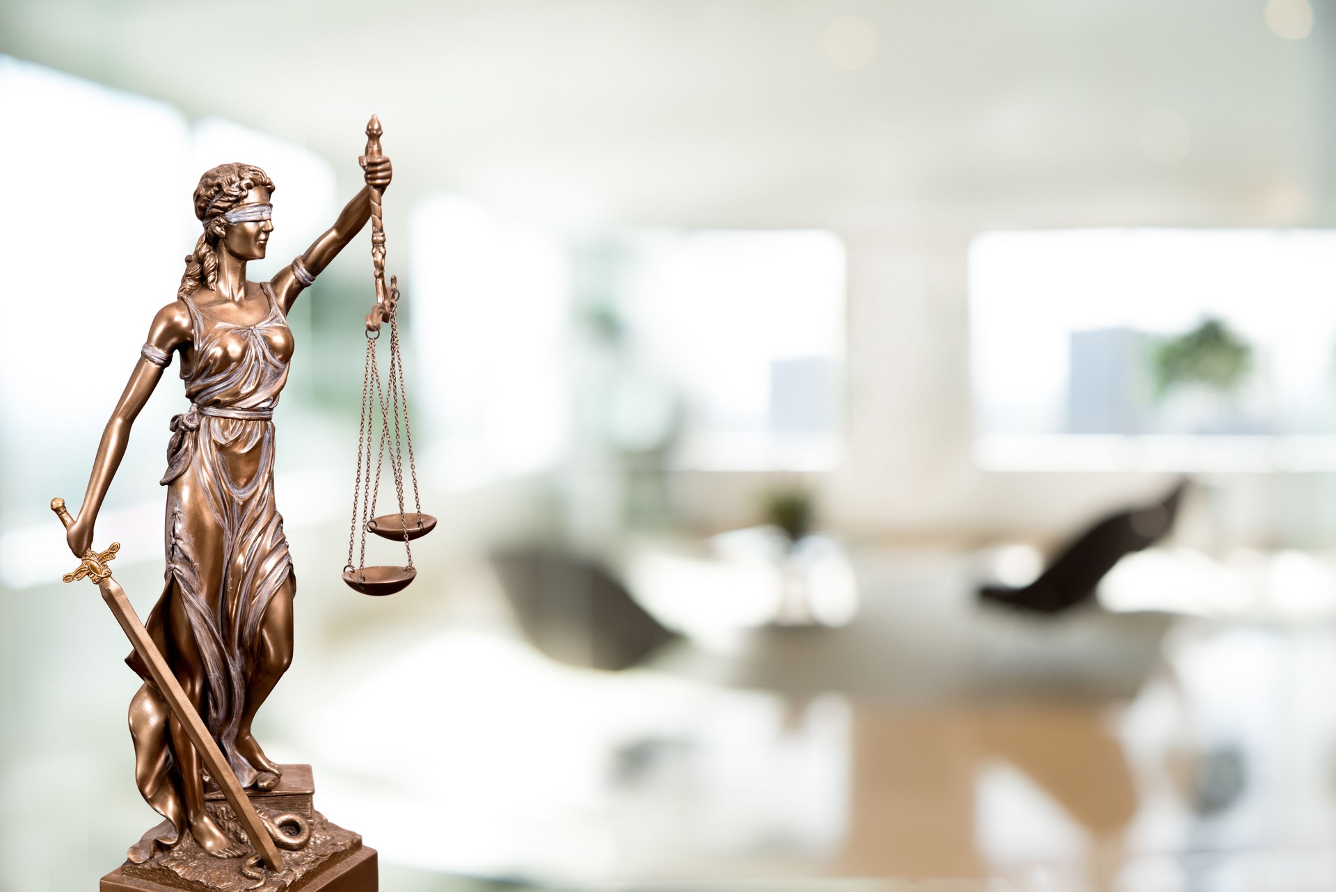 Statue Of Lady Justice In An Office